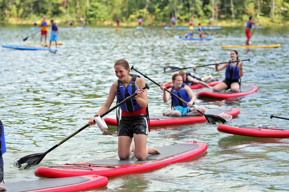 students on paddleboards